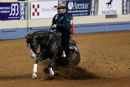 Big man, big saddle, small horse - yet one of the top reining competitors in the country, and not likely to be questioned over his weight.